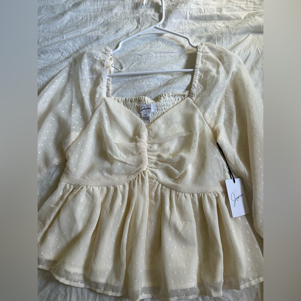 Trendy flow top